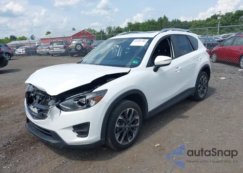 2016 Mazda Cx-5 Grand Touring z USA, uszkodzony, nr VIN JM3KE4DY5G0799129